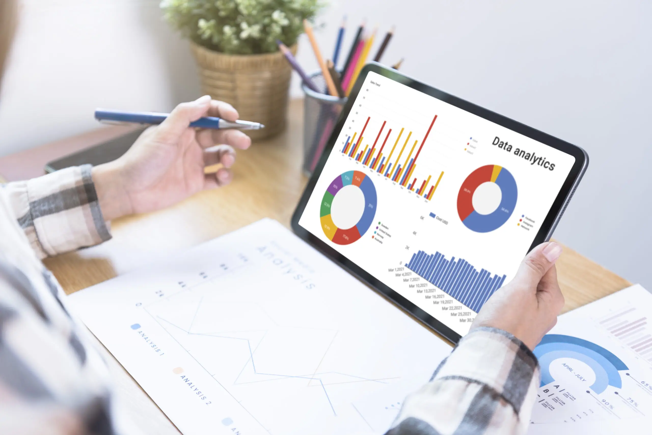 businesswoman-using-a-tablet-to-analysis-graph-com-2024-12-06-10-48-05-utc-scaled